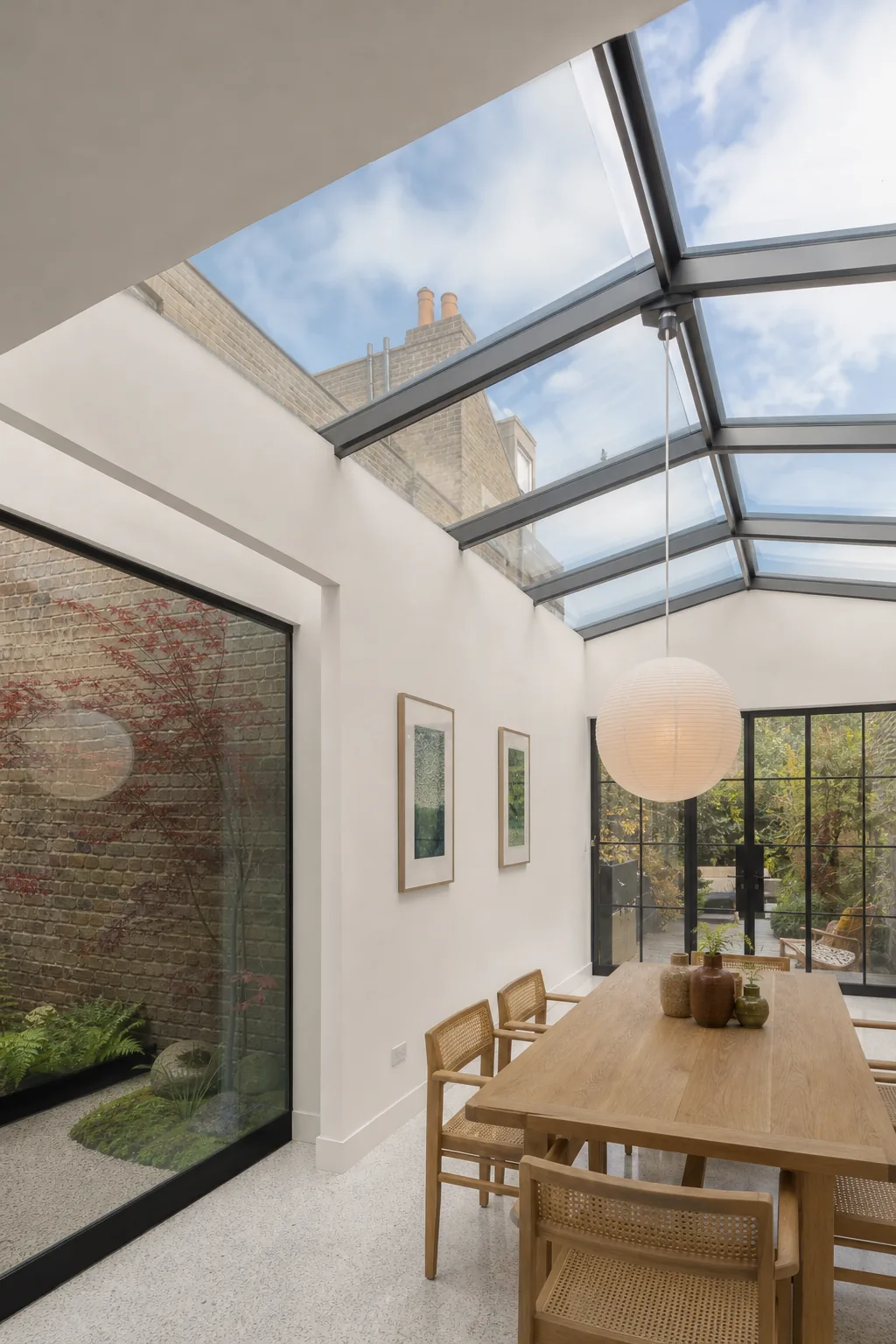 Open Plan Kitchen Around a Glass Roofed Courtyard in Islington, London, photo 4 of 4